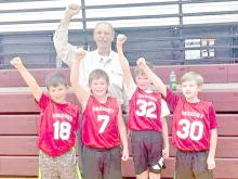 In the second and third grade division, Gregory teammates consisting of l to r: Sawyer Sperl, Sully Sperl, William Bolander, and Caleb Collins, and earned a Championship Title. Sully made a free throw in the last game to claim the victory. They were coached by John Malm.