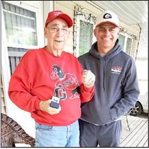 Gorilla Head Football Coach Mike Murray presented Dewey Allum with a championship ring to commemorate his membership on the 1958 state 11A championship team.