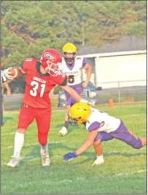 Landon Keiser, #31, had three touchdowns plus an interception that he ran in for another touchdown in Friday’s game against Bennett County.