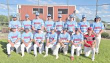 The 2026 Burke Bombers are, back row, l to r: Coach Blake Hoffman, Beau Keith, Hunter Van Niewenhuyse, Riggin Temple, Blake boes, JJ Farner, Kade Braun, and Rhoss Oliver; front row, l to r: Coy Determan, Brogan Glover, Ben Witt, Jad Leber, Aaron Sundquist, Gannon Thomas, and William Hemming. Not pictured: Christian Schweigert and Sawyer Tietgen.