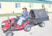 Brady Knight will be driving this tractor and pulling this trailer to Texas, there he will distribute donated items to the homeless. (Dan Bechtold/Winner Advocate Photo)