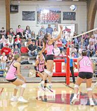 Aubree Miller was a strong presence at the net with seven kills in last Thursday’s Pink Out game against Burke.