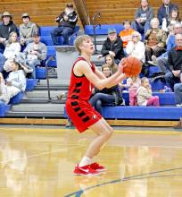 Caleb Sinclair shoots from behind the three-point line in Gregory’s win over Jones County. (Photo by Maya Hull)