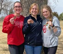 All three girls on Gregory’s junior varsity golf team earned medals at their home meet on April 12. Shown left to right, Gabby Jung shot a 57 to place seventh, Lily Jacobsen came in 11th with a 60, and Kaydence Klein won the tournament with her 49. (Submitted photo)