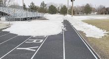 Winter weather has been a formidable foe for the Gregory track team this spring. Members have been working to shovel one clear lane around the track, but this long and deep drift in front of the stands has been a challenge. Only a few feet remain before both ends meet in the middle. The state of the track is not unique to Gregory; all but indoor meets have been canceled so far this season. Hopefully better weather will arrive in time to salvage at least the last part of the track season.