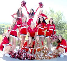 The cheer/dance squad consists of back row, l to r: Paige Rezac, Cindy Khuu, and Kaydence Klein. Middle row, l to r: Kaelynn Rezac, Adyson Stukel, coach Lenna Braun, Eliana Fiebelkorn, and Savanah Lozano. Front row, l to r: Madison Graber, Mia Haines, Brynn Bearshield, and Kennley Sedlacek.