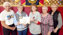 American Legion Auxiliary of Gregory was recognized for reaching 114% in membership, surpassing their goal. State President Patsy Madsen presented Cindy Diekmann, membership chairperson for Unit 6, a certificate for 91 members. Janice Grenoble, Cheryln Shaffer, and Sandi Jones were also present at the presentation.
