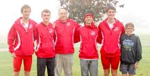 Headed to the 2025 State Cross Country meet are Abigail Engel, Isaac Hull, Ryler Stevicks, Coach Lonnie Klundt, Luke Barreto, George Timanus, and Robby Ring.