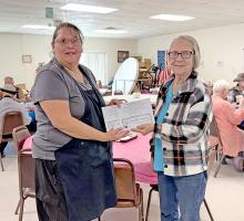May is National Beef Month, a time to recognize and honor the ranchers, farmers, and producers who dedicate their lives to raising high-quality American Beef. Deana Nelson is shown here presenting two beef certificates to Bernadine Holmberg of ROCS Dining Services on behalf of the Rosebud Rancherettes.