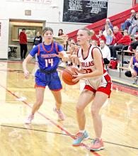 Sadie Carlson tries for two points during the match-up against the Parkston Lady Trojans on Friday, February 7, 2025. (Photo by Madi Graber)