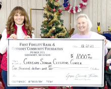 Rhonda Vaughn-Waterbury, left, board member for the FFB and Gregory Community Foundation presented a check for $1,000 to Velma Harmacek, right, for the Gregory Senior Center. The funds will be used to improve the center for their members.