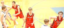 Keiser, Caleb Sinclair, and Jacob Klein work together on offense.