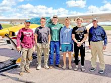 GHS graduate Luke Murray (left) and instructor Brent Combs (right) brought their planes for the GHS aviation class. Students are, l to r: Dale Smikle, Matthew Smith, Lincoln Juracek, and Mason Janak.