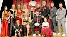 The 2023 Homecoming court was back row, l to r: Cindy Khuu, Jordan Svatos, runnerup Ashton Eklund, London Flakus, Kadyn Fisher (winning envelope delivery), Gannon Thomas, runner-up Kade Braun, Rylan Peck, and Trey Murray. Front row, l to r: Crown bearer Aaron Nguyen, Queen Mya Determan, King Nathan Fortuna, and Crown bearer Alice Begeman.