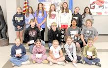 Dallas American Legion Poppy Poster winners are pictured back row, l to r: Navaeh Pore, Mileena Chasing Hawk, Avaya Vomacka, Adelyn Veskrna, Regan Graesser, Harper Wenger, and Sarah Odegard. Middle row, l to r: Sully Sperl, Jed Sengelmann, Jayden Songer, and Malachi Pore. Front row, l to r; Everly Veskrna, Raelyn DenHerder, Lainee Beck, Rykel Reurink, and Zane Sedlacek. (Photos by Kristy Ring)