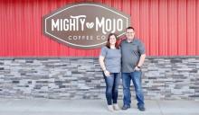 Trisha and Dan Cahoy stand outside Cahoy’s General Store in Lake Andes. The couple was recently awarded South Dakota Retailer of the Year for their commitment to customer service and community engagement. (Photo by Jennifer Leither / Mitchell Republic)