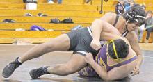 Zakery James finished off Alex Yellow Boy in 49 seconds in the Storm’s dual against Bennett County Tuesday night. (Photo by Alexis Kortan)
