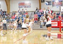 Ella Sperl sets the ball for Dani VanDerWerff in Thursday’s matchup against Platte-Geddes. (Photo by Kristy Ring)