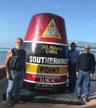 Anderson, Keith Swedlund, and Jim Selle, shown l to r, stopped to pose for a photo at the southernmost point of the United States in Key West, FL.