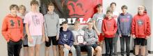 The Gregory eighth grade tracksters earned a team championship at Lyman. The team includes back row, l to r: Pierce Stukel, Mason Janak, Rane Kenzy, Nick Kenzy, Cruz Klundt, Jackson Bolander, Paul Sinclair, Jhett Eklund, Luke Stukel, Cole Serr, Noah Bearshield and Jad Leber.