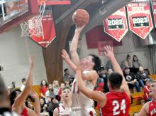 Cruz Klundt #11 puts the ball in the hoop for 2 of his 23 points against the Wagner Red Raiders last Tuesday night, and finished the week of play with 48 points.