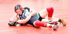 Daytona Paris works on pinning her opponent at the Yankton Girls Invitational on Friday, February 7, 2025. She went 4-2 at the tournament to finish in 4th place. (Photo from Burke School District Facebook page)