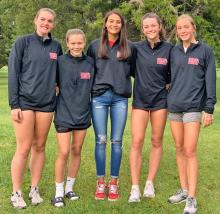 Wagner Invite girls varsity champions are pictured from l to r: Kodi Timanus, Emily Grim, Sierra Rencountre, Emma Thomas and Asia VanDerWerff.