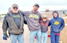 Three generations of the John Vosika family recently helped distribute food for Feeding South Dakota in Gregory. Shown left to right, they are John, Melvin, Jace, and friend Tate Reinartz.