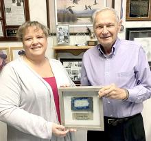 Sandi Karl-Wernke and Elmer Karl are pictured with the plaque saying “South Dakota Community Foundation - Elmer Karl - Hometown Hero - Community of Gregory”.