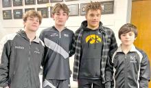 Four B/G wrestlers, l to r: Owen Hansen (1st), Jhett Eklund (4th), Gunnar Stephens (1st) and Judd Hansen (3rd), wrestled their way into the state wrestling tournament to be held in Rapid City.