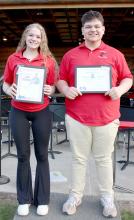 Seniors Eli Barreto, right, and Kaydence Klein, left, received the John Philip Sousa and Louie Armstrong awards, respectively, for their outstanding achievements in concert band and jazz band.