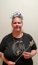 Librarian Tara Engel was crowned queen of the library institute at her last training.