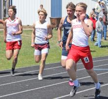 Noah Bearshield, far left, and Paul Sinclair, far right, are shown here in the 100 meter dash. (Photo by Gracie Stephens)