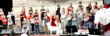 The Gregory B-K and kindergartern sang Mittens and Gloves and If I Could Fly Like A Snowflake during the concert under the direction of Katie Opp. The first and second graders, below, sang Christmas Card and Christmas in Any Language. The bottom picture is the performance of The Big Chill (Hoping for a Snow Day) by the third, fourth, and fifth grader.