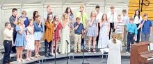 The sixth grade choir kicked off the evening’s performance on Monday, April 28, 2025, with three selections. Thula Klizeo had them clapping and sshh-ing during different parts.