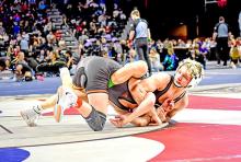 Dane Johnson, at 106 pounds, was the Storm’s only place finisher at the state tournament. (Photo by Kamre Peabody)