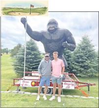 Back row, the Gregory Gorilla, front row, l to r; golf ball from hole 3’s tee box, David Fogel, and Eli Fogel. (Picture by Doug Pochop)