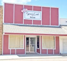 Spring Creek Boutique closed suddenly this year. The windows have recently been covered, but for months displayed the same merchandise. There is no indication as to whether the building is for sale at this time.