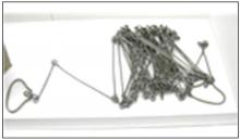 Surveying crews in Dakota Territory measured the land using a Gunter’s chain, like the one shown above. A Gunter’s chain is on exhibit in the museum at the Cultural Heritage Center. (Photo courtesy South Dakota State Historical Society)