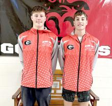 Cruz Klundt, left, and Fin Adams, right, were selected to the South Dakota Cross Country Academic All State Team. To be a member of the team, a member has to have participated in three years of high school cross country and have a 3.5 cumulative grade point average.