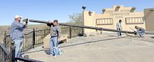 A new flag pole was installed at the observation park on the Buttes last Tuesday after the old one was damaged by strong winds. The new cable will hold a much bigger (30’x60’) flag.