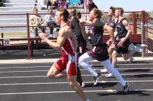 Kade Stukel (#2) came home from the Platte-Geddes Relays with three gold medals last Saturday. He won the 100 meter dash in 11:61, and was part of the first place 1600 meter sprint medley and 4x400 meter relay teams. (Submitted photo)