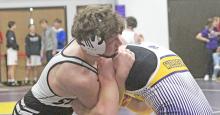 Kaleb Schonebaum holds his own against opponents who far outweigh him. (Photo by Dan Bechtold, Winner Advocate)
