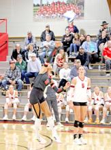 Haylie Vaughn, #0, puts the ball over the net in the Spikers’ win over Andes Central/Dakota Christian last Monday.