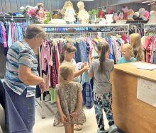 On Wednesday, June 21, Gregory County 4-H held Assemble an Outfit Workshop in conjunction with the Burke Thrift Center. Youth were able to collaborate and create their own outfits from thrifted clothes. They made a wide variety of outfits, ranging from trench coats and ties to dresses and jackets, and learned about matching colors, making cohesive outfits, and pairing neutral colors that go together.