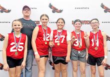 Coach Hank Wonnenberg took five girls to Canistota to compete in a 3 on 3 basketball tournament. They were l to r: Meadow Wonnenberg, Coach Hank Wonnenberg, Addyson DuFrane, Lashya Graesser, Lydia Wonnenberg, and Mayme Reber. The girls earned a first place finish.