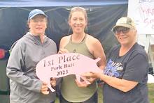 The Three Sisters team of Rachelle Bloom, Amanda Determan, and Laura Petersen won first place in the pork butt division at Ribfest.