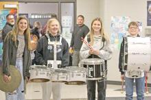 The students of Gregory Elementary School put on their own version of Macy’s Thanksgiving Day parade through the high school hallway on Tuesday. A drum corps of middle school band students Avery Birkel, Gracelyn Lanz, Ava Schweigert, and Robby Ring led the parade to the cheers of the middle school and high school students lining the hall.