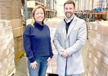 South Dakota Farmers Union partnered with Farmers Union Enterprises to donate 35,000 pounds of pork to Feeding South Dakota. Lori Dykstra, CEO Feeding SD, left, and Luke Reindl, South Dakota Farmers Union, right, are pictured above.