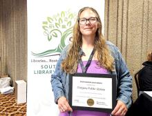Library Director Tara Engel is shown here with the certificate of accreditation that she was awarded at the South Dakota Library Association Conference on September 26, 2024.